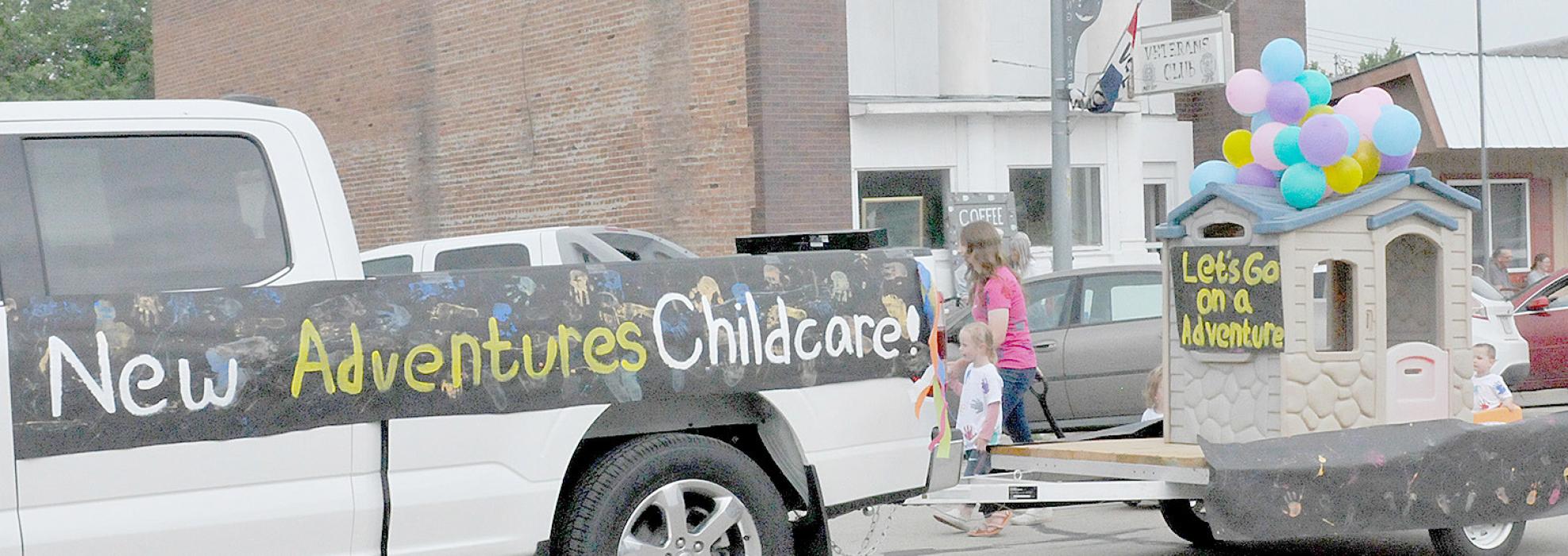 First place parade winner was New Adventures Child Care float.