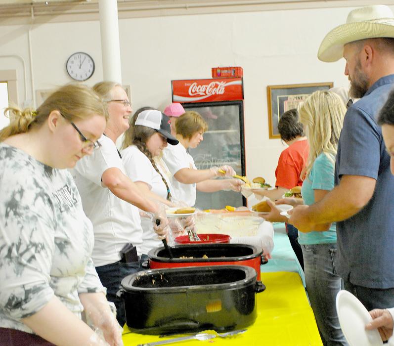 A freewill donation lunch was served at The Palace. Pulled pork, salad, chips, dessert and a drink were provided.