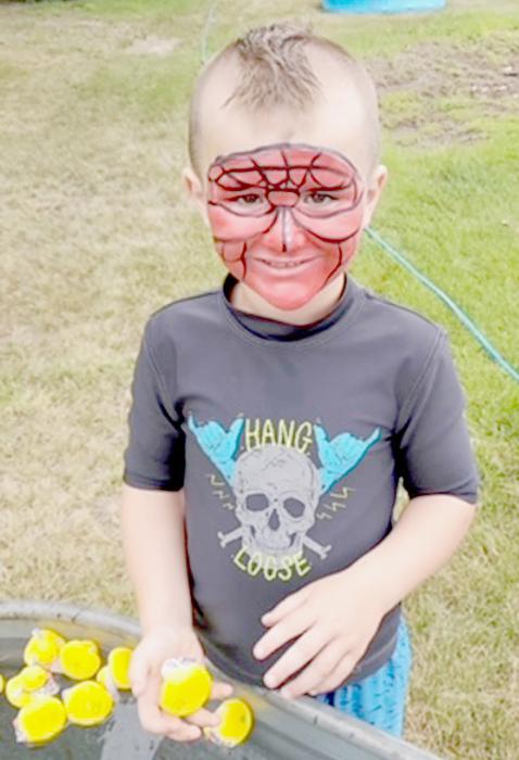After having his face painted, Rowdy Zeigler, played the duck game.