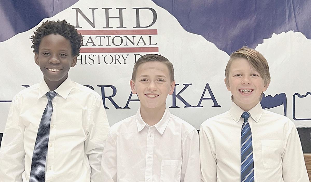 The Ainsworth Middle School team of (Left to Right) Keith Munnu, Max Hasenohr and Paul Denny have qualified for the National History Day Contest to be held in College Park, MD in June.
