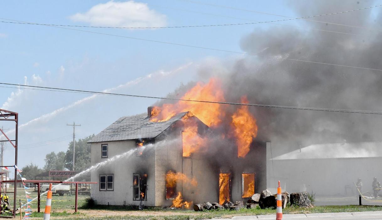 Area Fire Departments Burn House as Training Aid