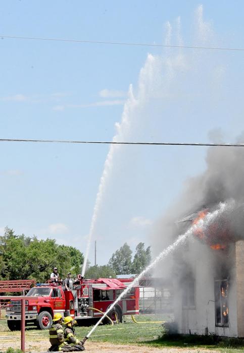 Area Fire Departments Burn House as Training Aid