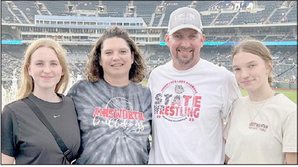 Nelly Hoche (left) is a foreign exchange student from Berlin, Germany and is being hosted in the United State by the Pozehl family in Long Pine. She is pictured with (left to right) Jessica Pozehl, Matt Pozehl and Jolyn Pozehl.