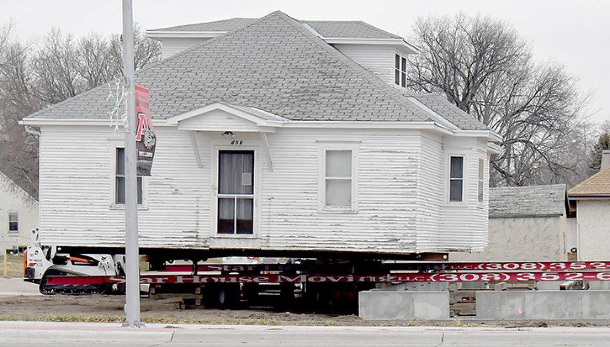 Once the house was situated in line with the new foundation, it was slid along large beams until it was positioned exactly where it needed to be and then set on the new foundation.