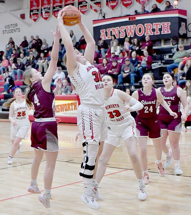 Joelyn Good pulls down a rebound in the Ainsworth Lady Bulldogs victory over the Stuart Lady Broncos.