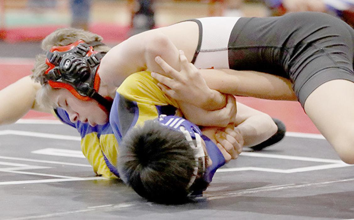 Holden Beel won three of this five matches in the 106 lb. weight class at the Ainsworth Invitational.