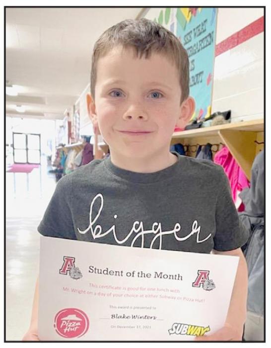 Kindergartner Blake Winters (right) was selected as the December Student of the Month at McAndrew Elementary.