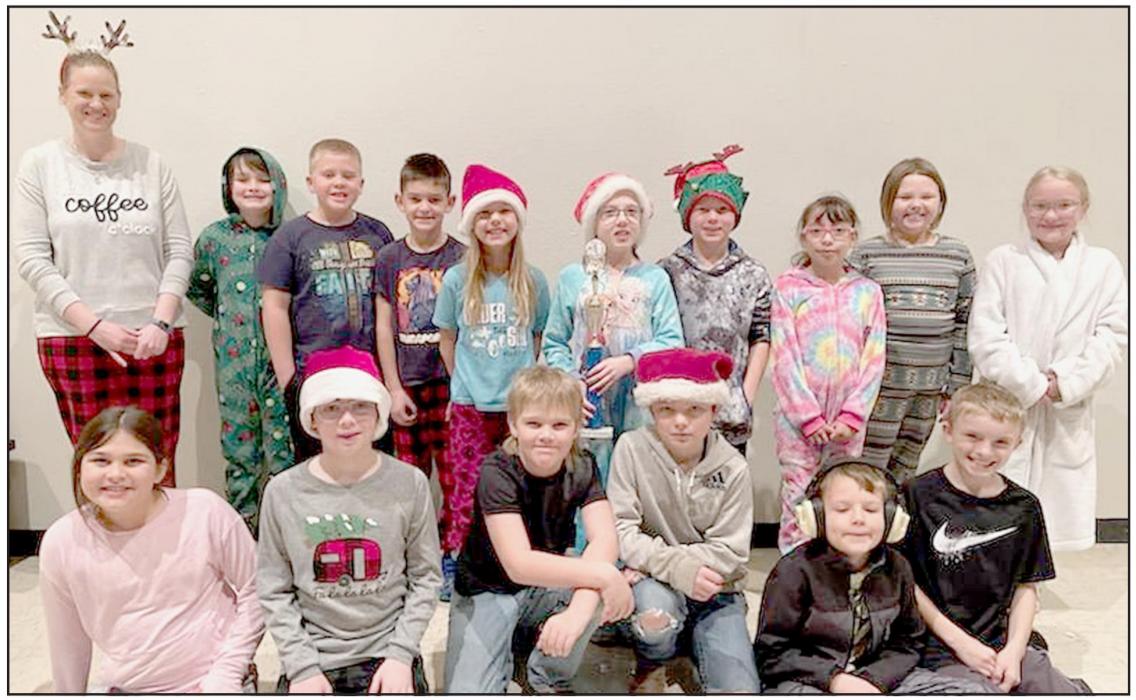 The December Class of the Month is Mrs. Carpenter’s third grade class. The third graders pictured are (Front Row - Left to Right): Adeline Hladky, Mason Shepperd, Trypp Marbry, Trypp Schmitz, Tance Tines and Tygan Sisson; (Back Row - Left to Right): Mrs. Carpenter, Brandon Miller, Caden Ferris, Dashiell Rathe, Emilyn Goochey, Anna Taylor, Andrew Arens, Renata Barcenas, Ava Freudenburg and Kailey Cook.