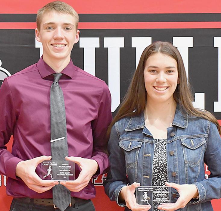 The Boys and Girls Cross Country MVPs were Ty Schlueter (Left) and Katherine Kerrigan (Right).