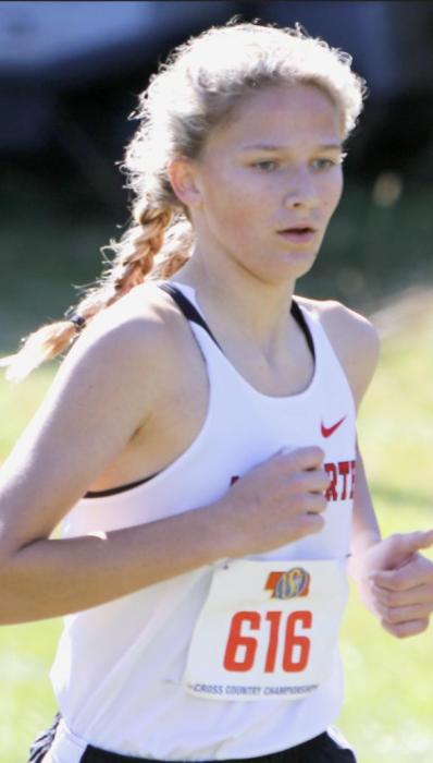 Three Ainsworth Cross Country runners took individual medals. Ty Schlueter (left) took first in the Class D Boys, Katherine Kerrigan (center) took sixth in the Class D Girls and Emma Kennedy (right) placed 12th in the Class D Girls.