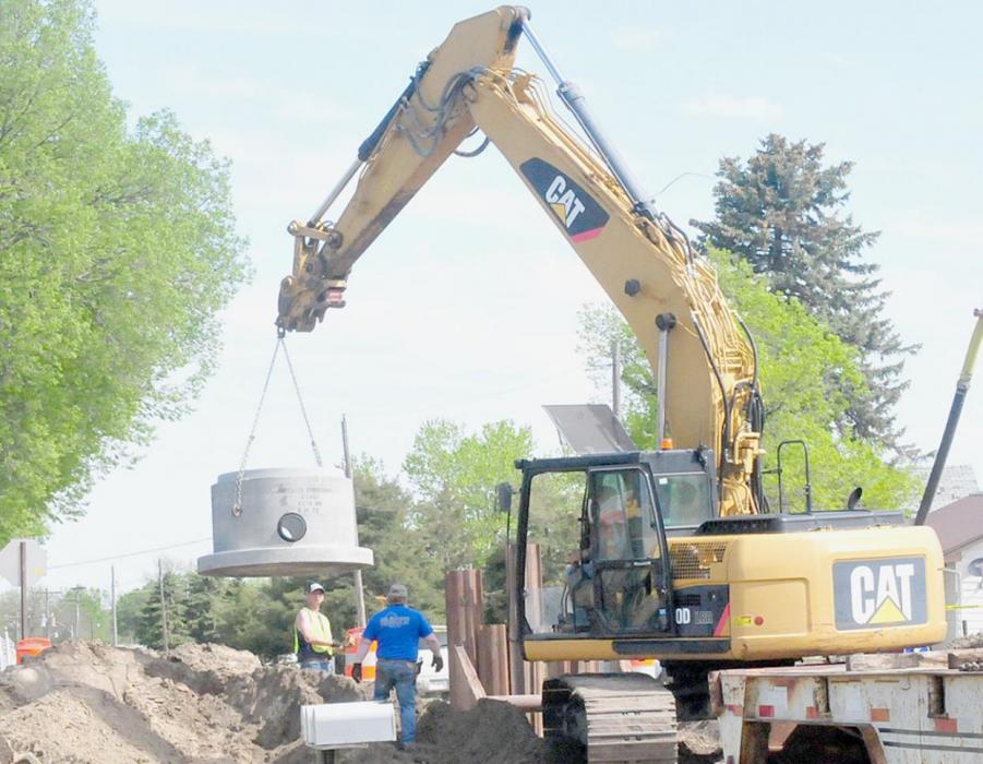 On the west edge of Ainsworth on Highway 20, the storm sewer system is being replaced. In the photo above on May 17th, a manhole is being lowered into the ground under the intersection of Wilson Street and Highway 20.