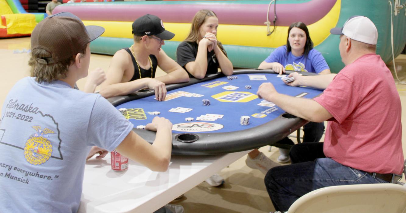 There is always time to have a good game of cards as shown by the students in the above photo.