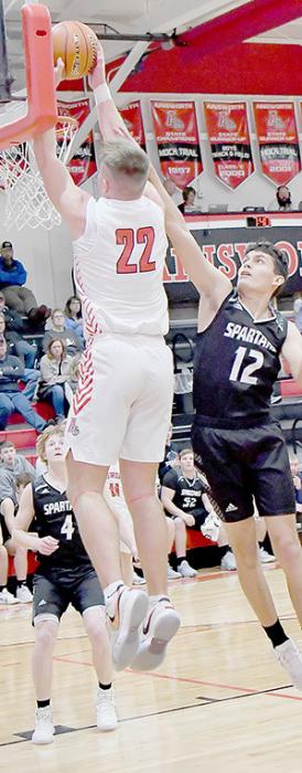 Carter Nelson gets a dunk off a pass from one of the Bulldogs during the Boyd County game.