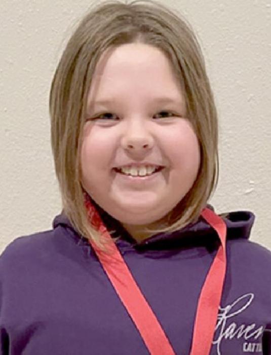 Third grade student Ava Freudenburg (right) was selected as the January student of the Month at McAndrew Elementary.