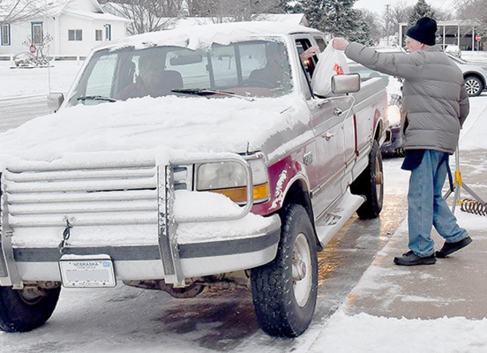 Dr. Melvin Campbell met vehicles as they drove up to the Methodist Church to affirm pre-orders and deliver dinners to the vehicles. Other volunteers delivered meals to individuals that couldn't get out.