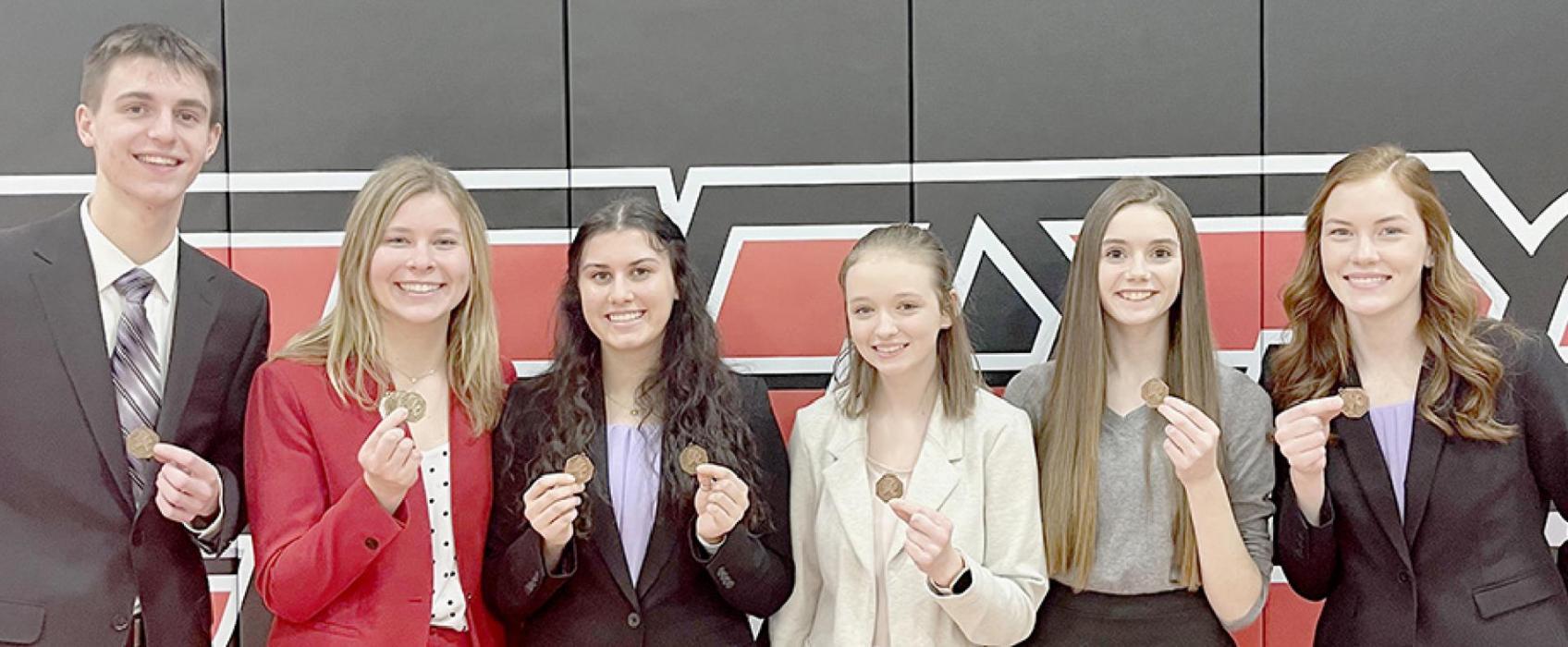 Receiving medals from the Broken Bow Speech Meet from Ainsworth High School were (Left to Right): Ben Flynn, Alyssa Erthum, Dakota Stutzman, Makenna Pierce, Taylor Allen, and Eden Raymond. Not pictured is Maren Arens.