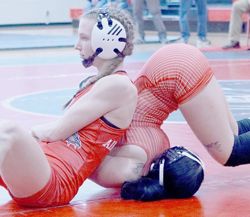 Jolyn Pozehl, 110 lbs., pinned all her opponents to take first place.
