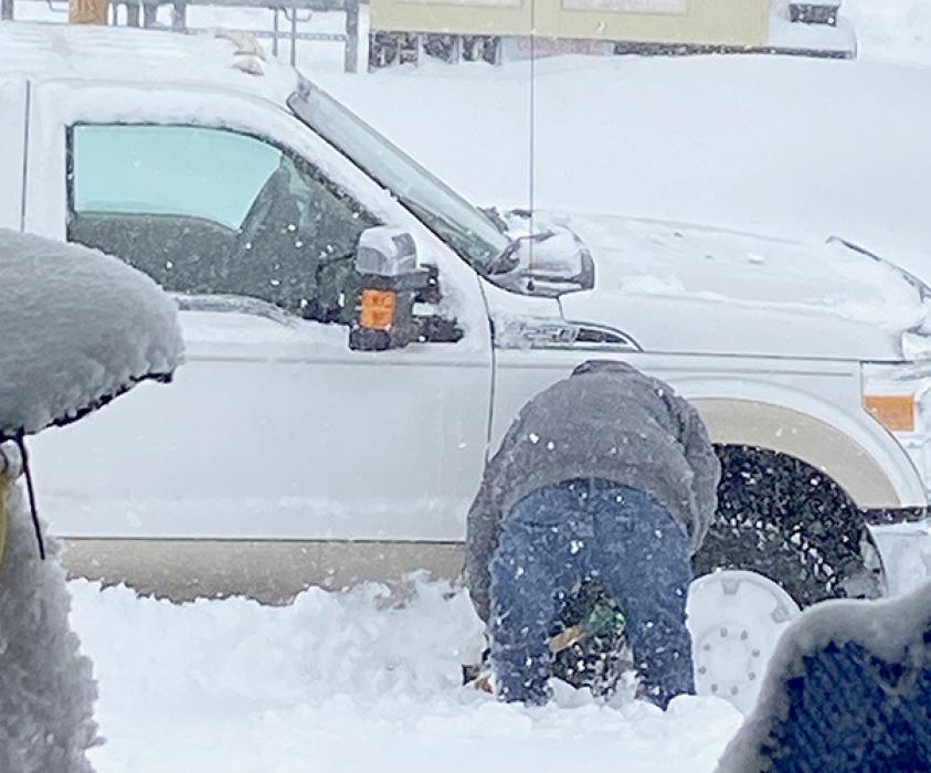 Some residents were out in the storm and had to dig out their vehicles after getting stuck.