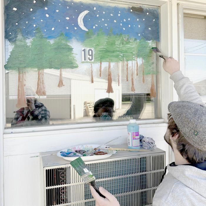 Ainsworth Art Club Paints Windows at Sandhills Care Center