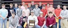 The AHS Football team posed with their District Championship plaque. The team finished with a 9-1 season with a District Championship and the school’s first state football playoff victory.
