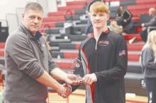 Senior wrestler Sam Titus was awarded the Outstanding Wrestler award during his final home invite of his career by Activities Director Luke Wroblewski. Titus won the tournament, going 3-0 on the day.