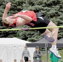 Carter Nelson Sets New State Meet Record in Class C High Jump Clearing 6' 10"