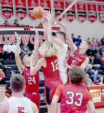 In a defensive battle between the Bulldogs and McCook Bison, Carter Nelson got mugged while trying to make a shot.