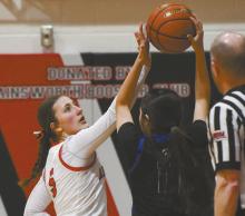 Freshman Addilyn Doke plays defense against Niobrara/Verdigre’s McKenzie Runnels.