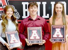 Three athletes received the 12 Sport Athlete Award for participating in three sports during their four year high school career. Receiving the awards were (left to right) Saylen Young, Ethan Fernau and Cameryn Goochey.