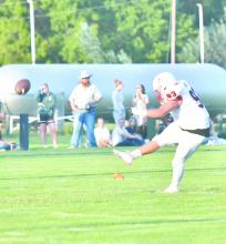 Senior Damian Hernandez kicks the ball off during the team's game against Sandhills-Thedford.