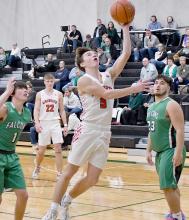 Treagan McNally went in for a lay up against Elkhorn Valley. McNally had 19 points against Elkhorn Valley including the winning three-point shot with just seconds left in the game.