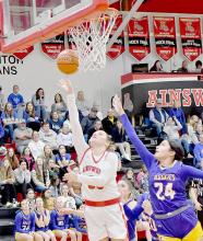 Karli Kral scores a basket in the first half against the West Holt Lady Huskies. Kral had 13 points and 5 rebounds against the Lady Huskies.