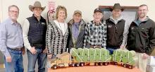 Pictured are members from Security First Bank and Valentine Livestock who were the winning bidders on Swede Lolley’s hand crafted wood hay hauler, L to R: Steve Brown, Trent Solida, Lisa Bellin, Greg Arendt, Swede Lolley, Tom Cooper, and Josh Krueger.