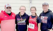 Gracyn Painter and Willa Flynn competed in the 2023 Nebraska Middle School Championship Meet in Gothenburg. Pictured (left to right) are Assistant Coach Clint Painter, Gracyn Painter, Willa Flynn and Head Coach Wade Alberts.