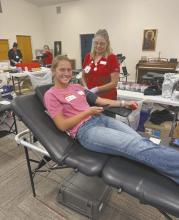 FFA Chapter President Megan Jones donates blood during the chapter’s blood drive. Over 30 community members donated blood during the event.