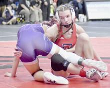 Jolyn Pozehl defeated Violet Aulner of Bellevue East by a fall in 2:35 for her first win of the State Wrestling Tournament.