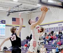 Trey Appelt goes up for two against Norfolk Catholic in the third quarter.