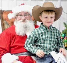 Rowdy Zeigler jumped up on Santa’s lap and told him what he wanted for Christmas when he saw Santa in Long Pine.