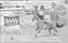 A 2017 graduate of Ainsworth High School, Sydney Graff, throws her lasso during the breakaway roping during the Labor Day. Graff narrowly missed her calf, resulting in a no time. Graff later competed in the team roping with her father, Terry.