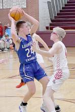 Senior Ben Barrow plays defense in the District Final. He averaged 2.3 points and 1.6 rebounds per game this season.