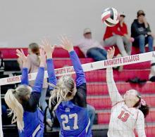 Dakota Stutzman (13), another senior at Ainsworth Community Schools, played her last home game at Lila McAndrew. Here she sends the ball back over to the South Loup defenders.