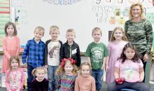 Mrs. Caren Fernau’s Kindergarten students share with you what “Christmas Is...” Her students are (Front Row - Left to Right): Luna Schroeder, Summer Holloway, Joslin Coleman, Jaiden Lehn and Elena Huerta Vicenttin; (Back Row - Left to Right): Emmy Johnson, Dax Painter, Karsyn Zwiebel, Brayden Arens, Hunter Lurz and Sophia Gilbert. Missing student is MiShayla Palmer.