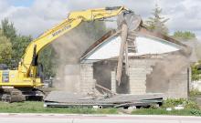 Bruce Dannatt demolished the 113 year old Dixon House on Tuesday, September 26th. The house was removed in preparation of moving the Coleman House Museum to the lot.