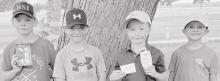 Boys golfing in the Age 6-8 Division were: (Left to Right): Mason Winters, Carson Hamilton, Scott Moser and Carter Johnson. Not pictured is Orion Markley, who was the division winner with a 2-Hole score of 15.