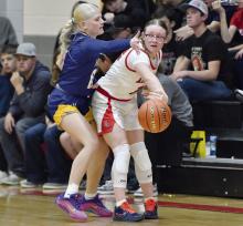 Gracyn Painter throws a wrap-around pass to her teammate.