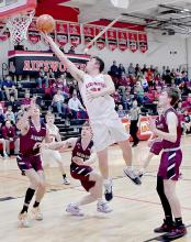 Trey Appelt stretches for two points against the Stuart Broncos. The Bulldogs downed the Broncos 52-42.