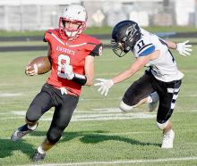 On the second play of the game, Traegan McNally got around the end to score on a 59 yard run. McNally also caught two passes for touchdowns and threw for three more touchdowns.