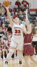 #33 senior Kaitlyn Nelson goes up for two points against the Gothenburg Swedes. Nelson currently leads the Dawgs in rebounds per game, averaging 8.1. Photo by Debb Gracey