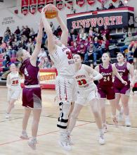 Joelyn Good pulls down a rebound in the Ainsworth Lady Bulldogs victory over the Stuart Lady Broncos.