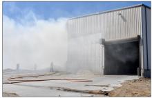 Firemen Respond to Hay Fire at Rolling Stone Feed Yard